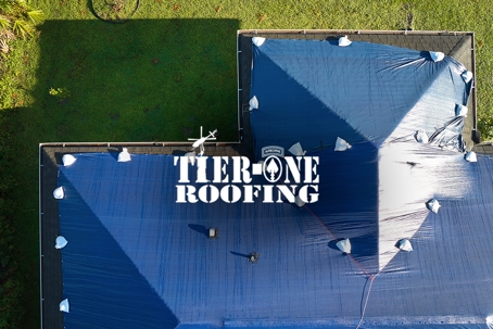 Roof Damage from Clogged Gutters | Tier-One Roofing Guide